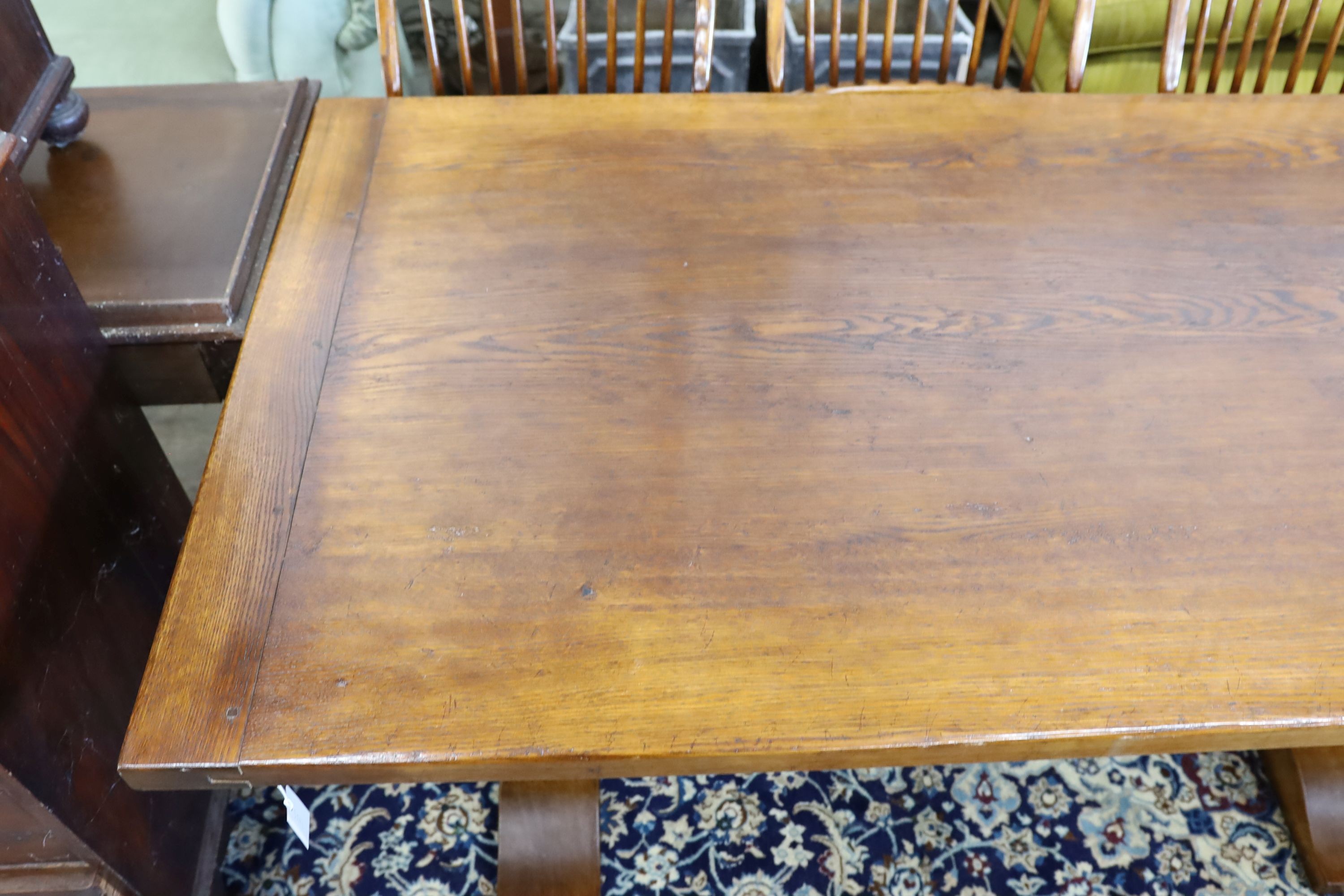 A 17th century style rectangular oak refectory dining table, length 183cm, depth 100cm, height 76cm